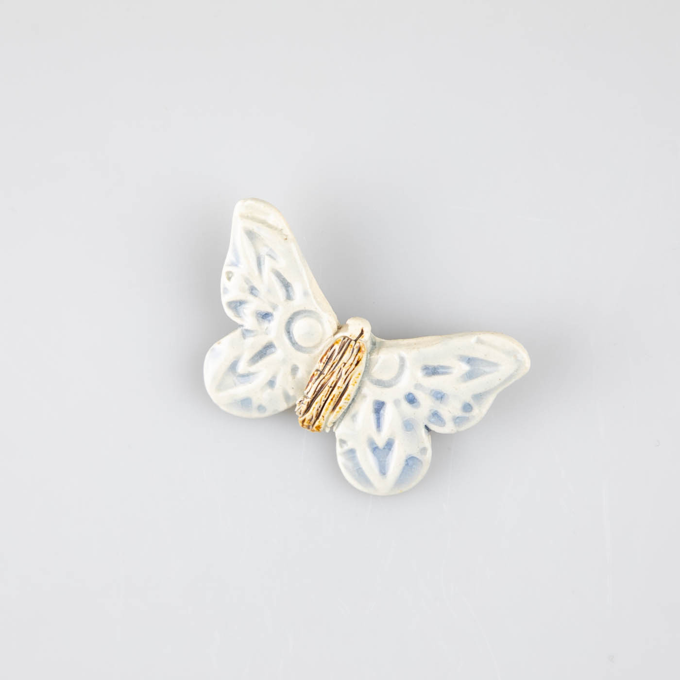 Broche mariposa – Raku